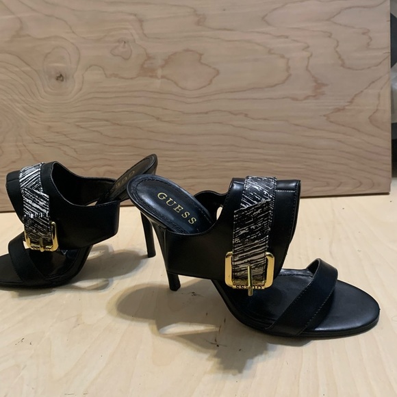 Gorgeous pair of Guess heels. Size 7 1/2. Ankle strap in black and white. - Picture 6 of 7